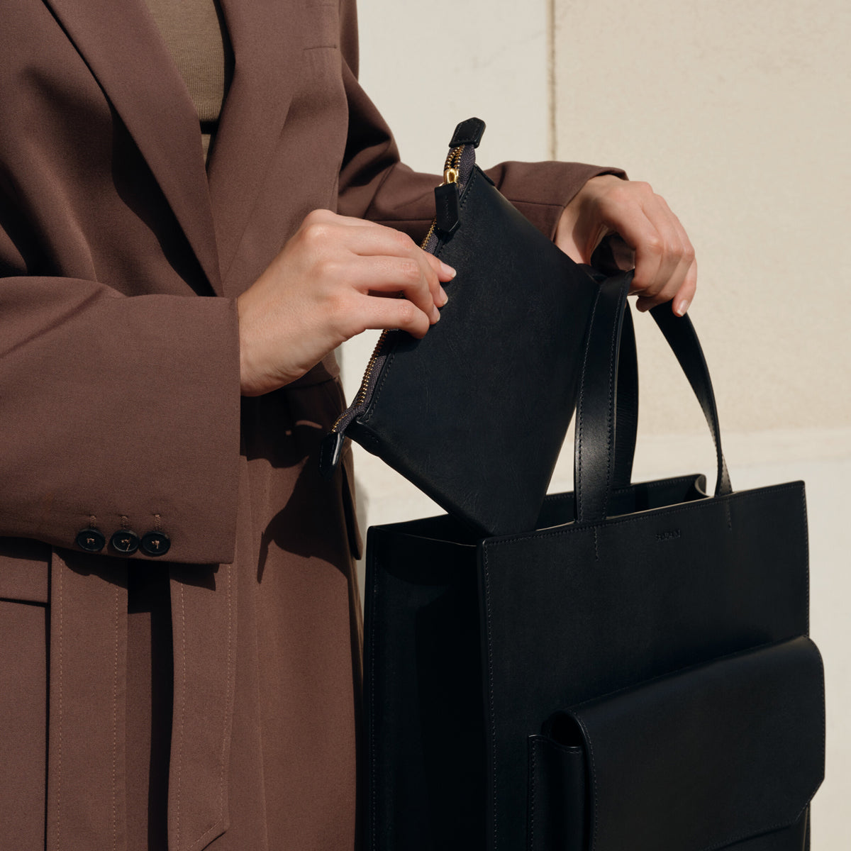 Sandain läder accessoarer